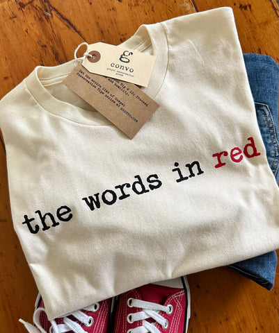 the words in red. Crew Neck, Short Sleeve Tee, Natural